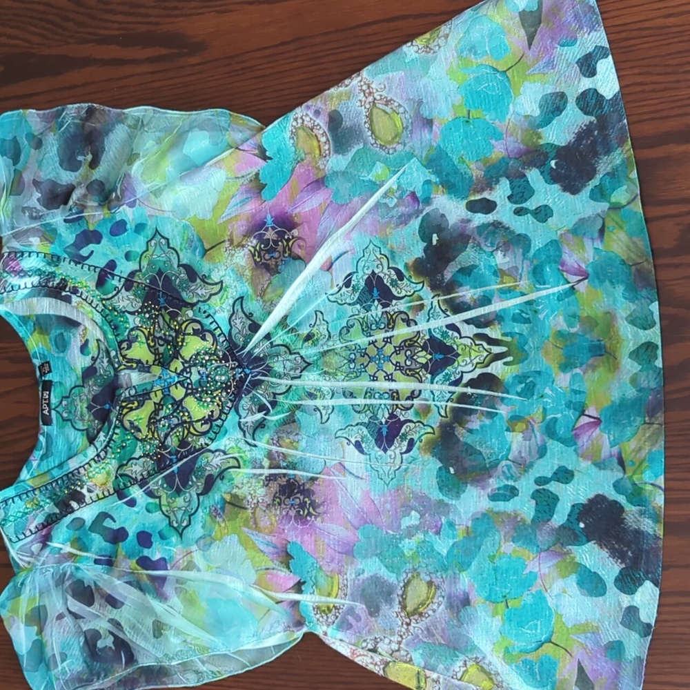 3 for $30. Colorful top with decorative neck line